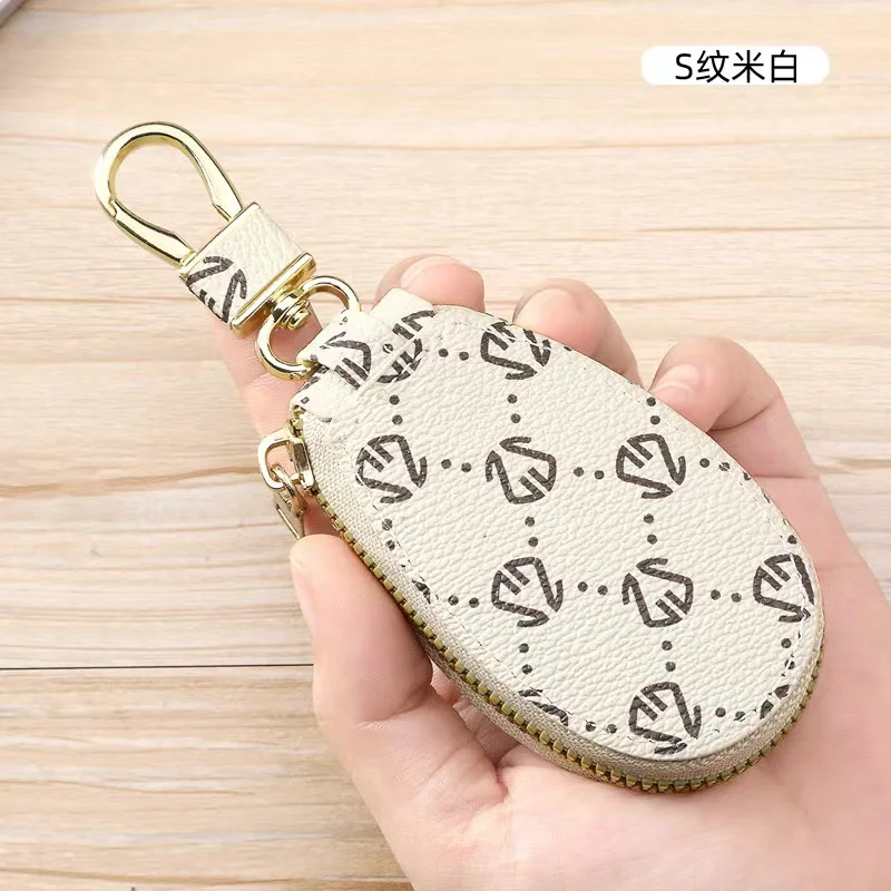 Bolso de cuero PU para llaves para hombres y mujeres, bolsa almacenamiento multifuncional gran capacidad, Simple y compacta
Bolso de cuero PU para llaves para hombres y mujeres, bolsa almacenamiento multifuncional gran capacidad, Simple y compacta