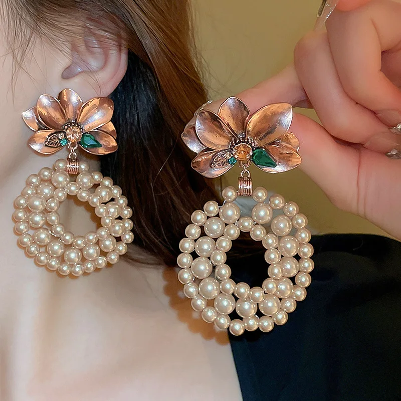 High Quality Hollow Out Drop Earrings For Women Full Of Simulated Pearl Plant Flower Accessories Ladies Party Jewelry Hot Sale
High Quality Hollow Out Drop Earrings For Women Full Of Simulated Pearl Plant Flower Accessories Ladies Party Jewelry Hot Sale