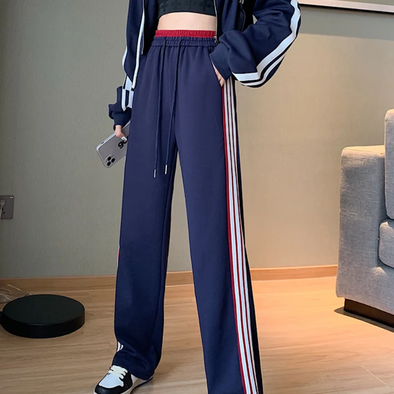 Синие спортивные брюки для женщин на осень, новые леггинсы на шнуровке для похудения, универсальные спортивные брюки с широкими штанинами, новинка 2023 
Синие спортивные брюки для женщин на осень, новые леггинсы на шнуровке для похудения, универсальные спортивные брюки с широкими штанинами, новинка 2023