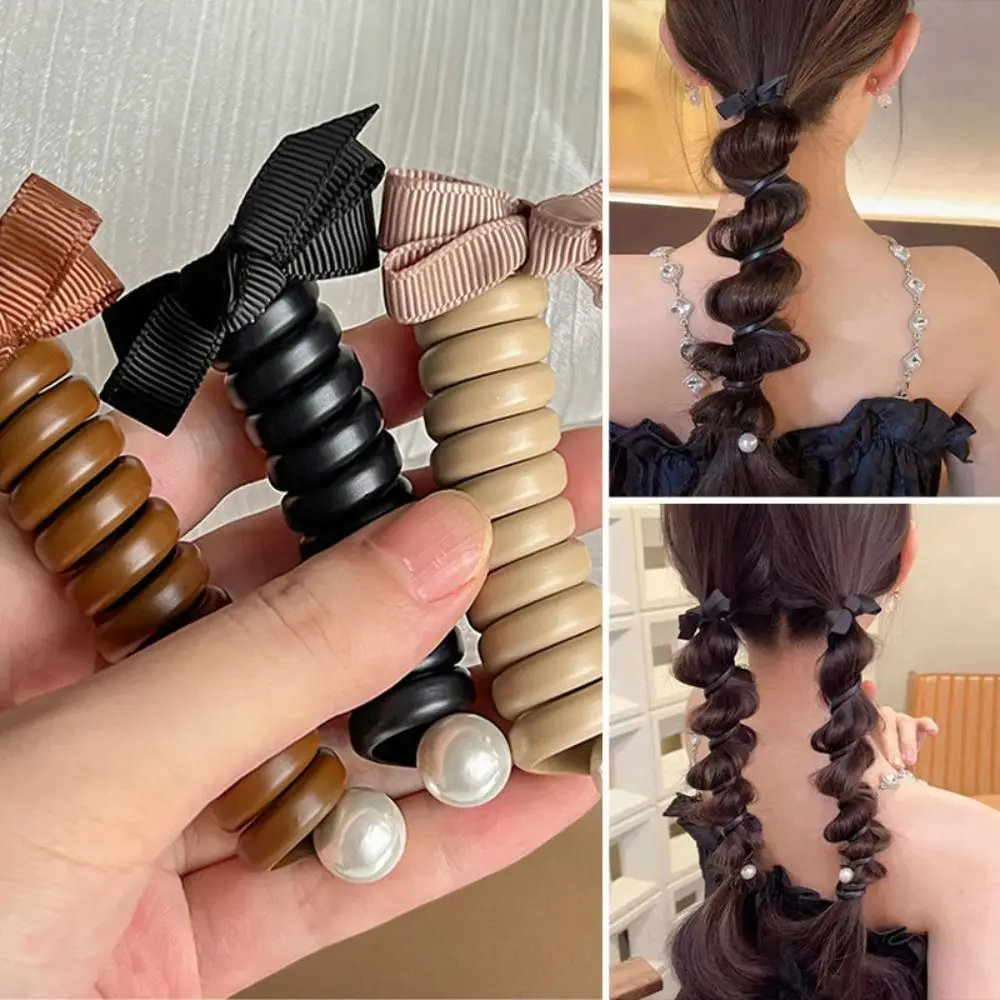 2PCS Plastic Telephone Wire Hair Bands Hairstyle Tool Pearl Ponytail Hair Rope Bowknot Braided Hair Weaving Artifact Women
2PCS Plastic Telephone Wire Hair Bands Hairstyle Tool Pearl Ponytail Hair Rope Bowknot Braided Hair Weaving Artifact Women