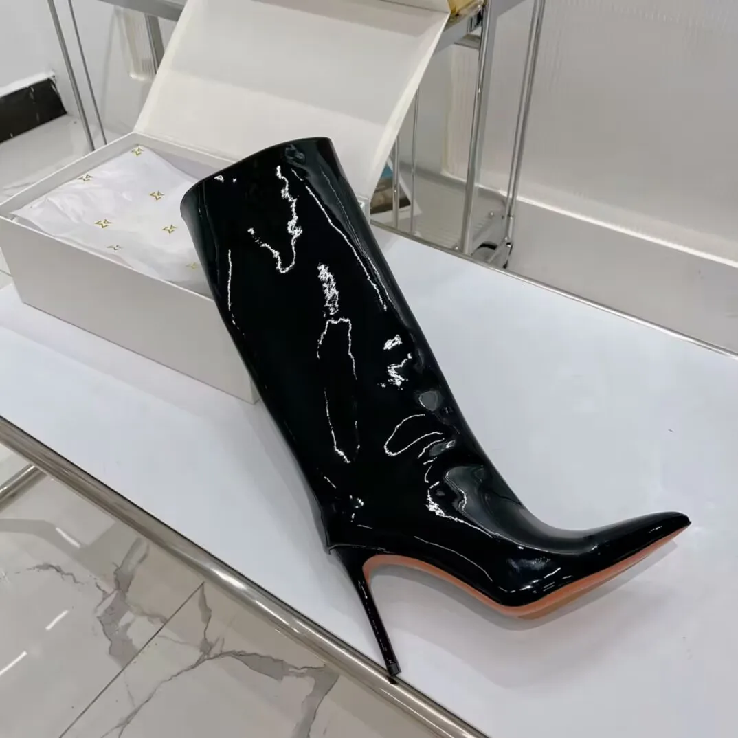 

Women Shoes Amina Muaddi Fiona Boots shiny patent leather striking stiletto heel pointed toe Pulls on designer fashion boot lady