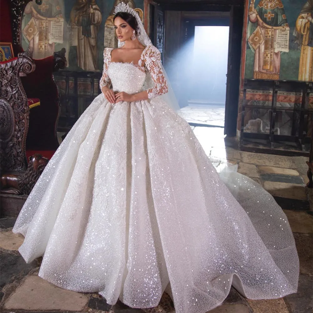 

Amazing Sparkly Wedding Dresses Princess Ball Gown Puff Long Sleeeves Lace 2022 Dubai Bridal Gowns Square Neck Pearls Royal