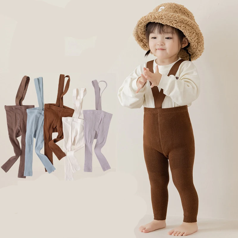 

New Baby Autumn Solid Pants Boys Girls Clothes Pit Strap Tight Jumpsuits Infant Elastic Leggings Cotton Soft Socks Overall 2023