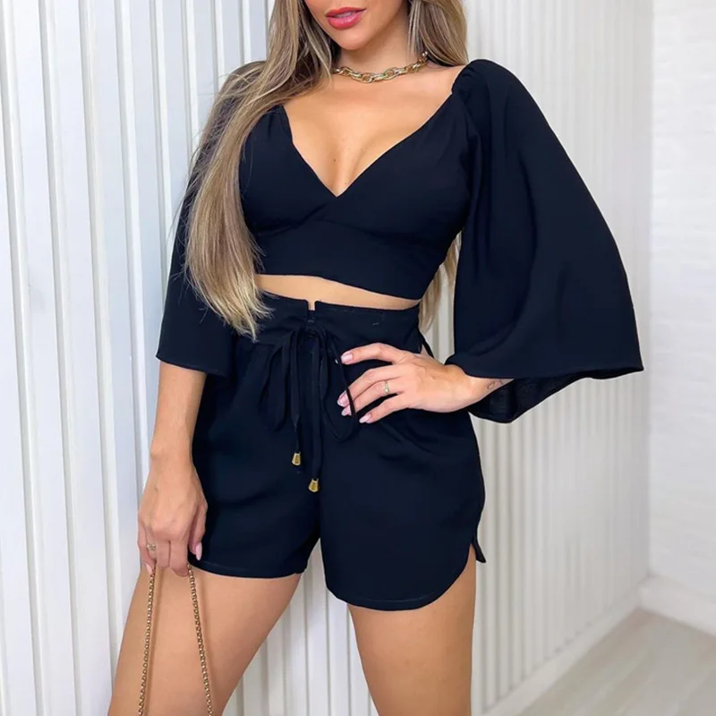 European and American Women's 2023 Spring New V-neck Open-back Flared Sleeve Shirt High-waisted Shorts Fashion Casual Suit
European and American Women's 2023 Spring New V-neck Open-back Flared Sleeve Shirt High-waisted Shorts Fashion Casual Suit