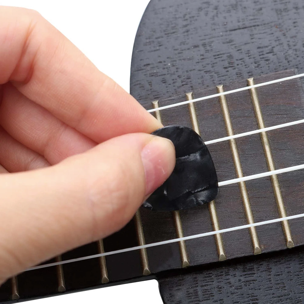 Celluloid Guitar Picks 0.5-1mm 12PCS 24 X 21mm Celluloid Electric Guitar Guitar Picks Plectrums 100% Brand New
Celluloid Guitar Picks 0.5-1mm 12PCS 24 X 21mm Celluloid Electric Guitar Guitar Picks Plectrums 100% Brand New