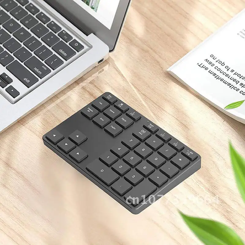 

Wireless Numeric Keypad 35 Keys Digital Keyboard for Accounting Teller Windows IOS Mac OS Android PC Tablet Laptop Bluetooth 5.0