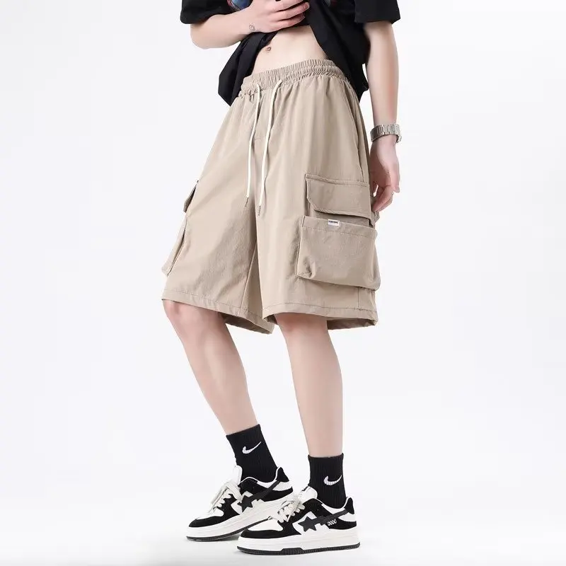 Мужские брюки-карго, новинка 2024 года, стильные свободные шорты в гонконгском стиле, мужские трендовые Брендовые повседневные брюки, прямые брюки со всем
Мужские брюки-карго, новинка 2024 года, стильные свободные шорты в гонконгском стиле, мужские трендовые Брендовые повседневные брюки, прямые брюки со всем