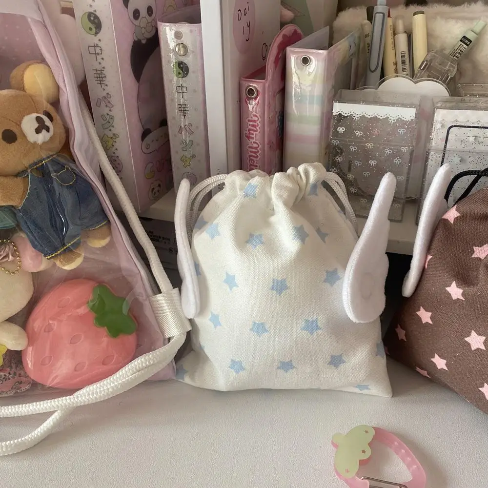 Korean INS Wing Stars Design Drawstring Storage Bag Portable Canvas Bundle Pocket Dustproof Stationery Storage Bag Organizer Bag Korean INS Wing Stars Design Drawstring Storage Bag Portable Canvas Bundle Pocket Dustproof Stationery Storage Bag Organizer Bag