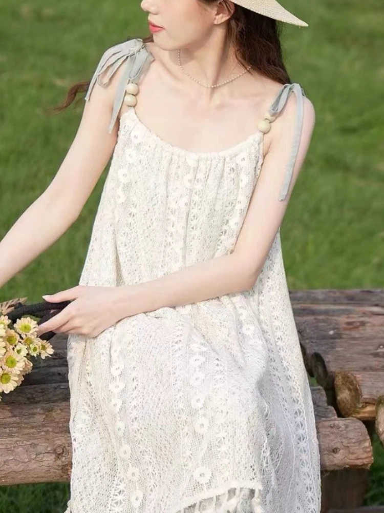 2023 New Summer Fragmented Flowers Lace Suspended Dress Lace Chiffon Fashionable Slim Covering Belly Beach Holiday Fairy Dress
2023 New Summer Fragmented Flowers Lace Suspended Dress Lace Chiffon Fashionable Slim Covering Belly Beach Holiday Fairy Dress