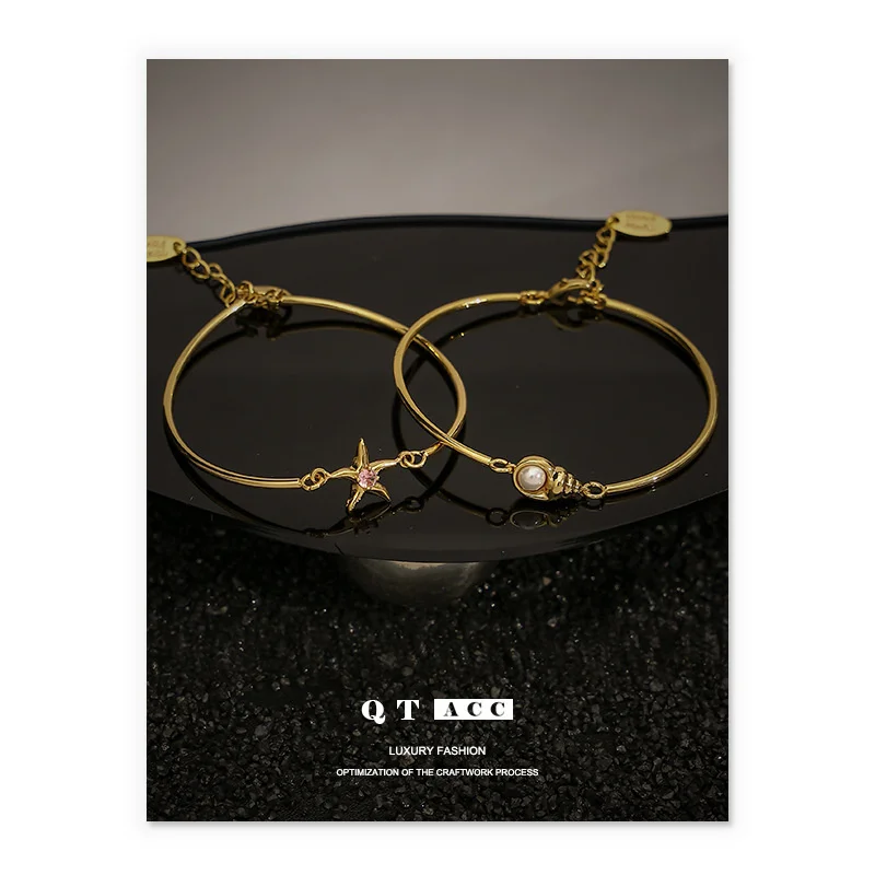 Латунное покрытие 18K Настоящее золото корейский стиль для летнего отпуска имитация жемчуга ракушка руки с морской звездой браслет наконечник 
Латунное покрытие 18K Настоящее золото корейский стиль для летнего отпуска имитация жемчуга ракушка руки с морской звездой браслет наконечник