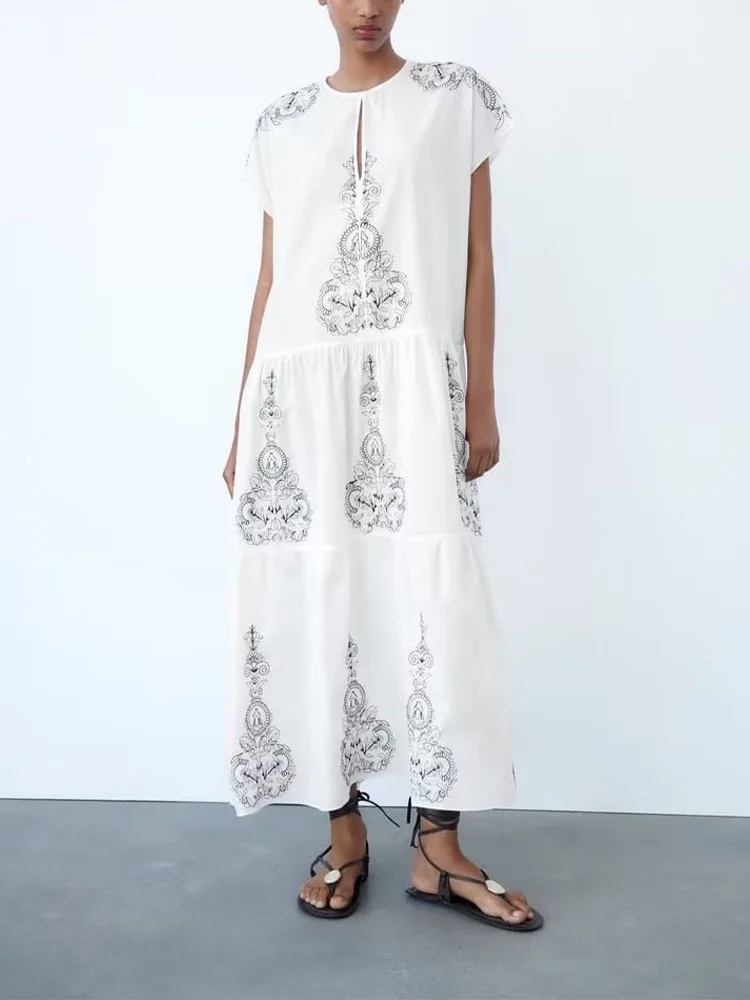 Summer new women's holiday round neck slit short-sleeved loose long skirt pure cotton color contrast embroidery mid-length dress
Summer new women's holiday round neck slit short-sleeved loose long skirt pure cotton color contrast embroidery mid-length dress