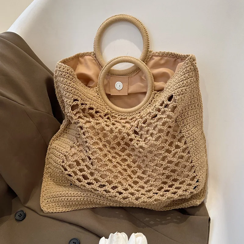 

Hollow woven bag, new women's bag, popular handbag, super popular bucket bag, niche design bag, convenient to carry when traveli