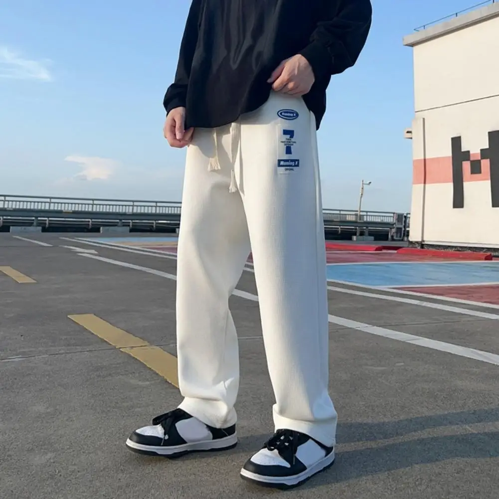 Mid-rise Elastic Waistband Men Pants Drawstring Pockets Logo Print Straight Wide Leg Casual Sweatpants Streetwear
Mid-rise Elastic Waistband Men Pants Drawstring Pockets Logo Print Straight Wide Leg Casual Sweatpants Streetwear