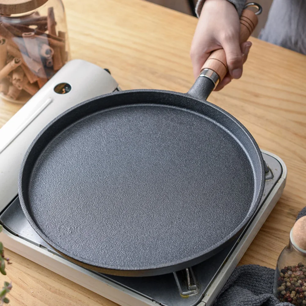 26cm Thickened Cast Iron Non-stick Frying Pan Cake Pancake Crepe Maker Flat Pan Fried Eggs Saucepan Kitchen Cookware
26cm Thickened Cast Iron Non-stick Frying Pan Cake Pancake Crepe Maker Flat Pan Fried Eggs Saucepan Kitchen Cookware