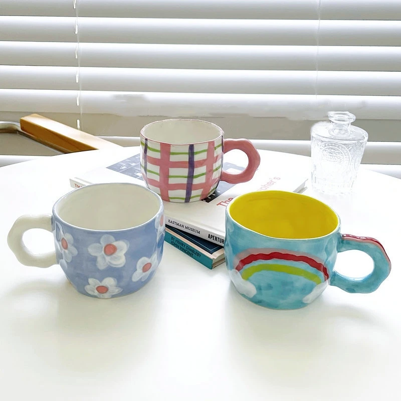 Ceramic Mugs Coffee Cups Hand Pinched Irregular Pure Hand-painted Underglaze Color Milk Tea Cup Cartoon Breakfast Mug Water Cup 
Ceramic Mugs Coffee Cups Hand Pinched Irregular Pure Hand-painted Underglaze Color Milk Tea Cup Cartoon Breakfast Mug Water Cup