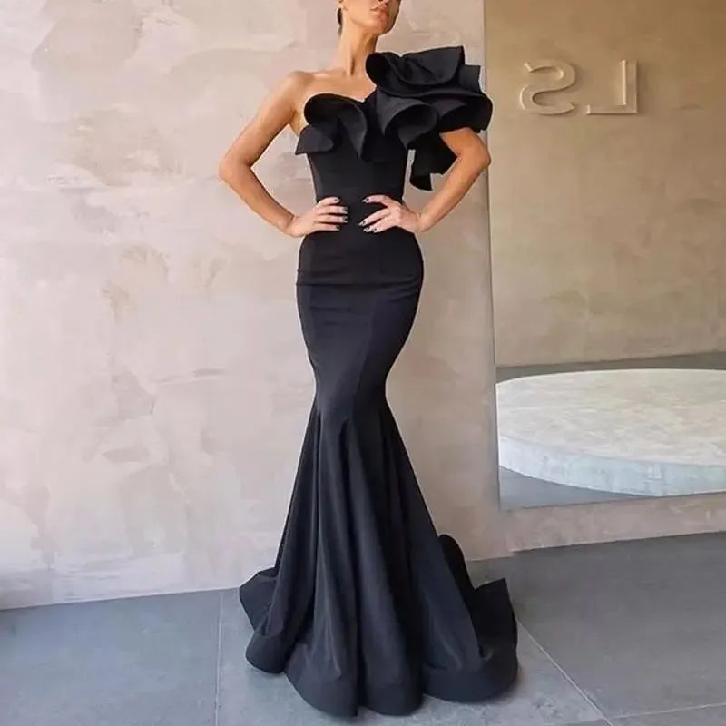 Sexy Black Satin One Shoulder Short Sleeve Mermaid Evening Dress Ruffles Backless Long Prom Dresses 2023 فساتين مناسبة رسمية
Sexy Black Satin One Shoulder Short Sleeve Mermaid Evening Dress Ruffles Backless Long Prom Dresses 2023 فساتين مناسبة رسمية