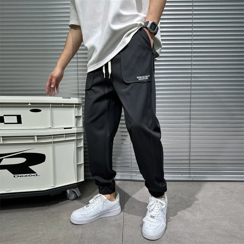 2023 Spring/Summer New Men's Versatile Sports Pants Loose Feet Guards Men's Elastic High Quality Simple Draping Casual Pants
2023 Spring/Summer New Men's Versatile Sports Pants Loose Feet Guards Men's Elastic High Quality Simple Draping Casual Pants