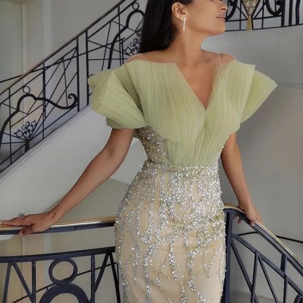 V-Neck Saudi Arabic Prom Dress Wedding Party Gown 2023 Luxury Crystal Beadings Sequined Mermaid Evening Dresses
V-Neck Saudi Arabic Prom Dress Wedding Party Gown 2023 Luxury Crystal Beadings Sequined Mermaid Evening Dresses