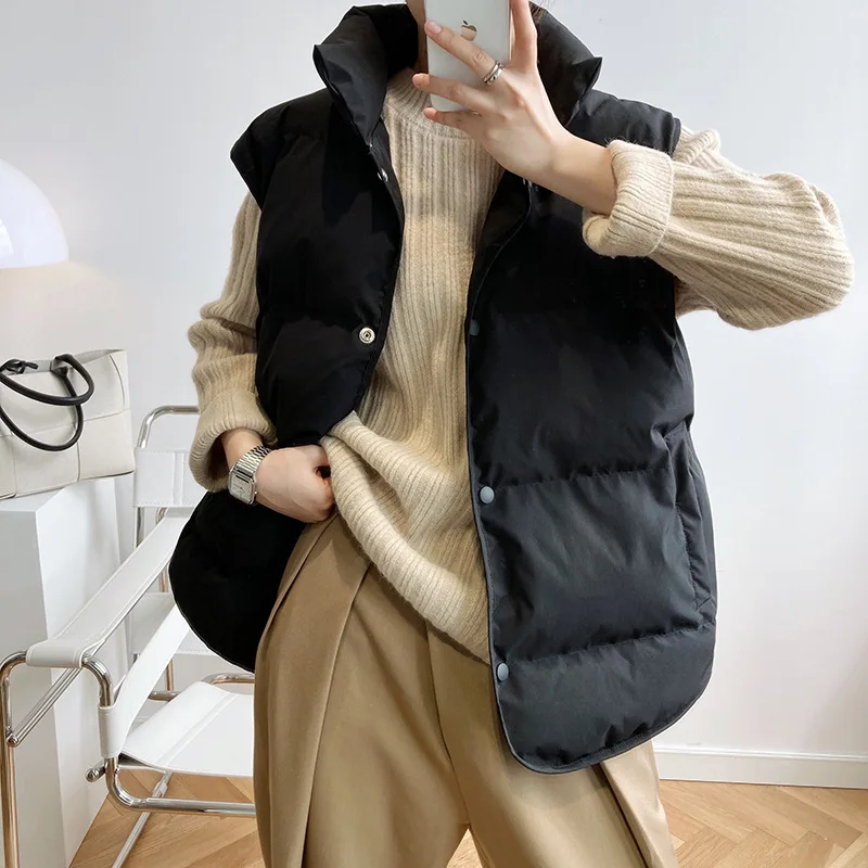Women Loose Sleeveless Vest Solid Stand Collar Winter 2022 White Duck Down Warm Coat Oversize Tops Puffer Jacket Padded Overcoat 
Women Loose Sleeveless Vest Solid Stand Collar Winter 2022 White Duck Down Warm Coat Oversize Tops Puffer Jacket Padded Overcoat