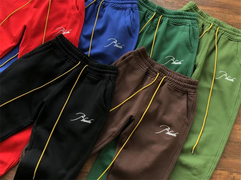 High Quality Terry Embroidery Letter Logo Rhude Men's Jogger Pants Men Woman Casual Sweatpants Kanye West
High Quality Terry Embroidery Letter Logo Rhude Men's Jogger Pants Men Woman Casual Sweatpants Kanye West