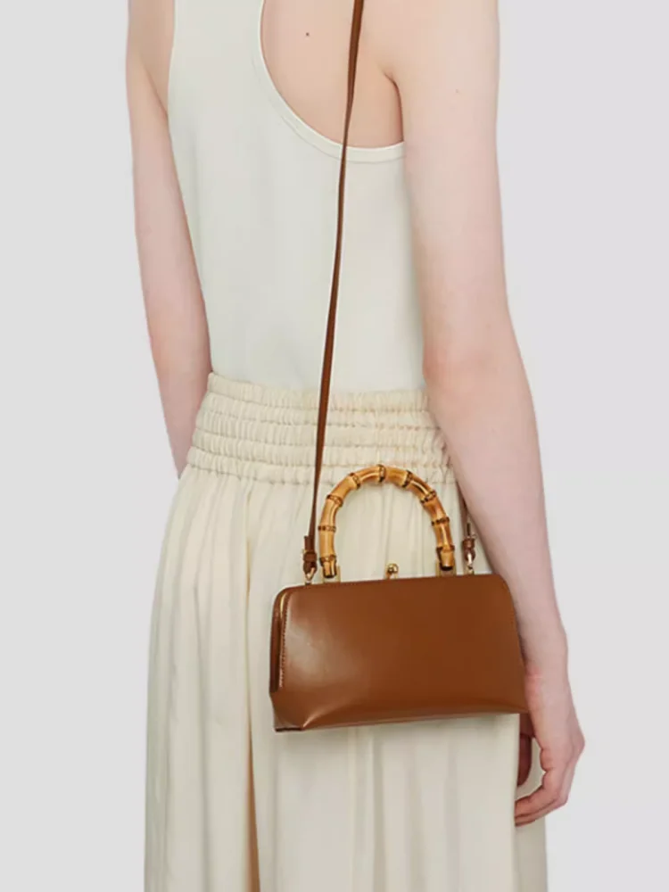 

Vintage Cowhide Bamboo Handle Handbag Women Shoulder Crossbody Gold Clip Baguette Bag Real leather Temperament Simple Bridal Bag