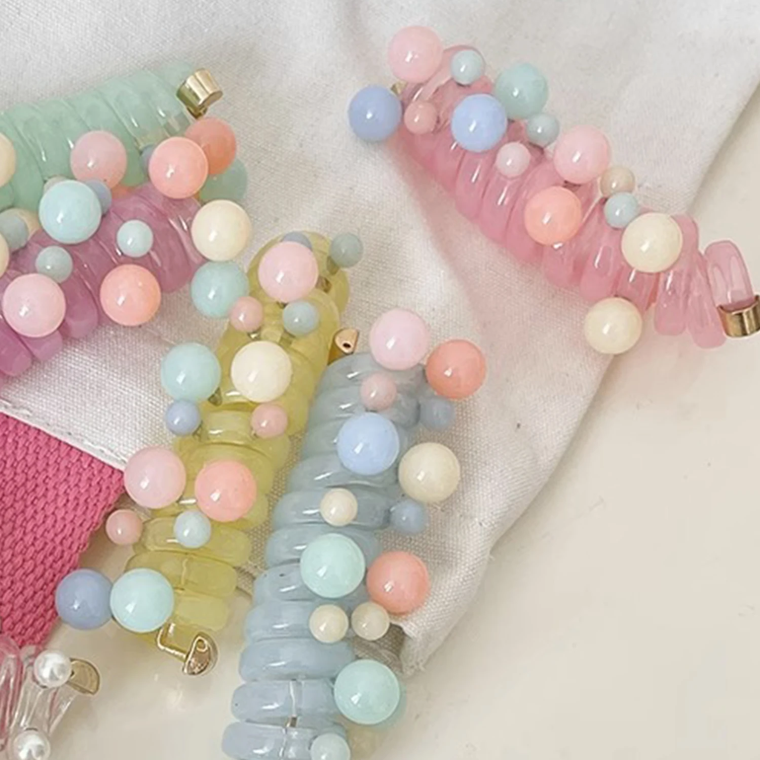 Korea Telephone Wire Line Hair Tie Ring Colorful Ball Spiral Shape Clear Color Rubber Elastic Hair Band Women Hair Accessories
Korea Telephone Wire Line Hair Tie Ring Colorful Ball Spiral Shape Clear Color Rubber Elastic Hair Band Women Hair Accessories
