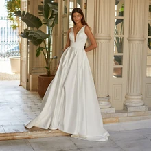 RANMO Simple Satin Wedding Dress With Separable Lace Long Sleeves Jacket A Line V Neck Pockets Chapel Train Church Bridal Dress
RANMO Simple Satin Wedding Dress With Separable Lace Long Sleeves Jacket A Line V Neck Pockets Chapel Train Church Bridal Dress