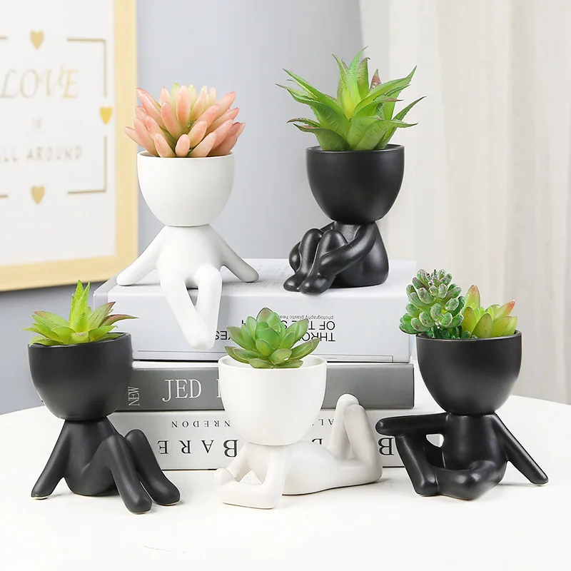 Creative black figure flowerpot Succulent plant flowerpot ceramic figure flowerpot statue home decoration pots for plants
Creative black figure flowerpot Succulent plant flowerpot ceramic figure flowerpot statue home decoration pots for plants