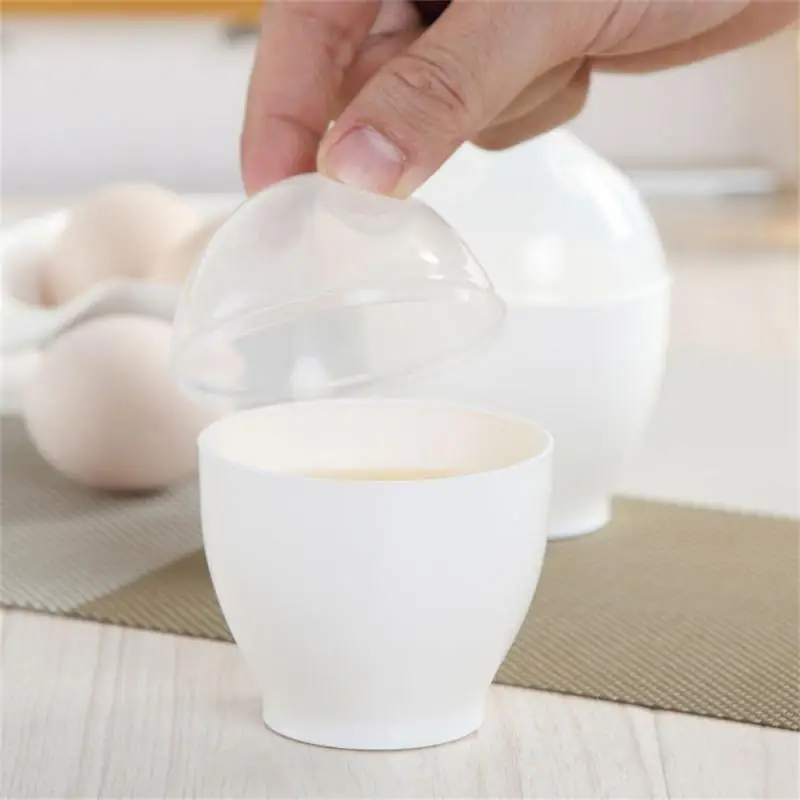 New Healthly Microwave Egg Cooker Boiler Maker Mini Portable Quick Egg Cooking Cup Steamed Kitchen Tools for Breakfast
New Healthly Microwave Egg Cooker Boiler Maker Mini Portable Quick Egg Cooking Cup Steamed Kitchen Tools for Breakfast