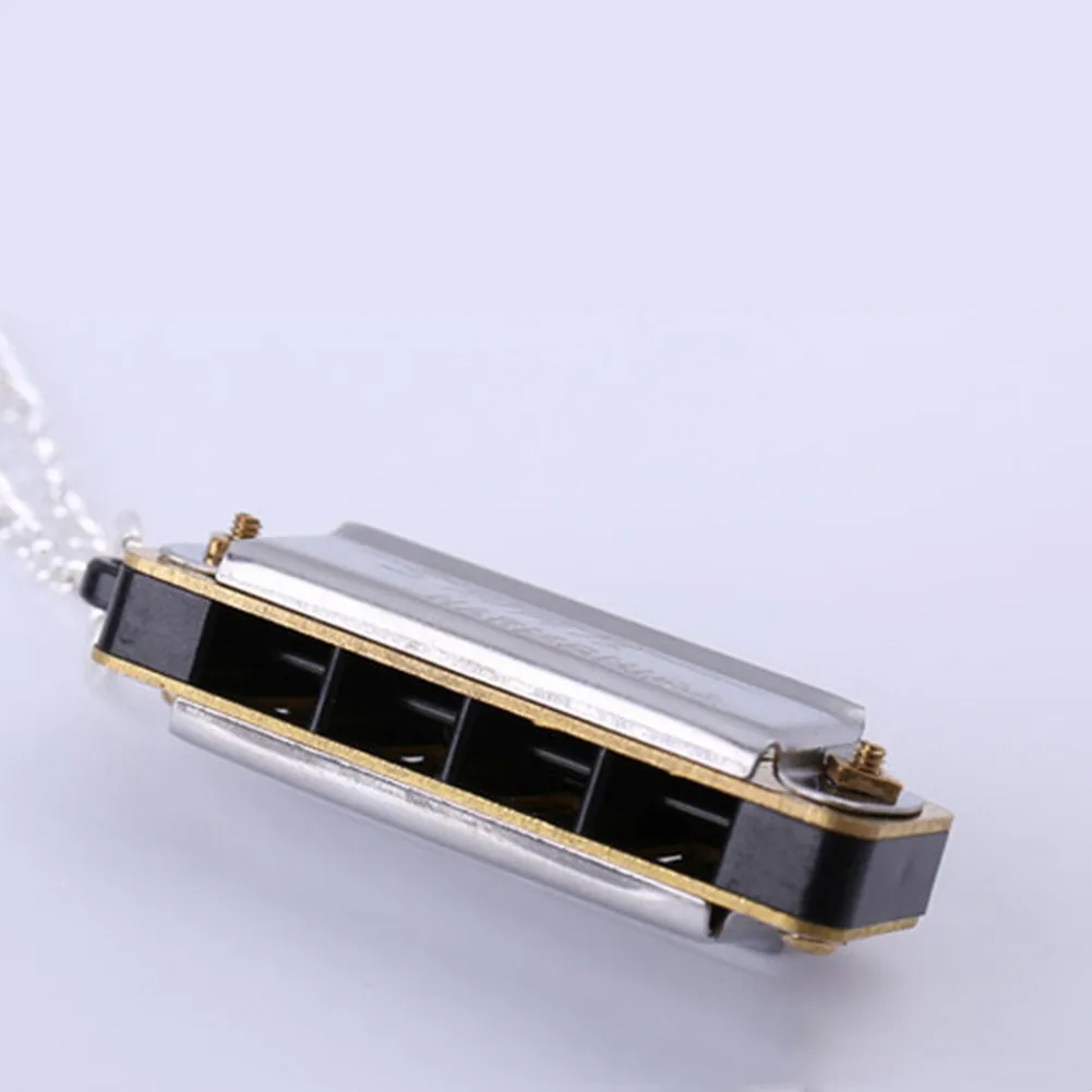 Children Keychain Harmonica With Keychain 1 X Mini Harmonica 4 Holes Sturdy Cover Plate Alloy Reeds Easy To Play
Children Keychain Harmonica With Keychain 1 X Mini Harmonica 4 Holes Sturdy Cover Plate Alloy Reeds Easy To Play