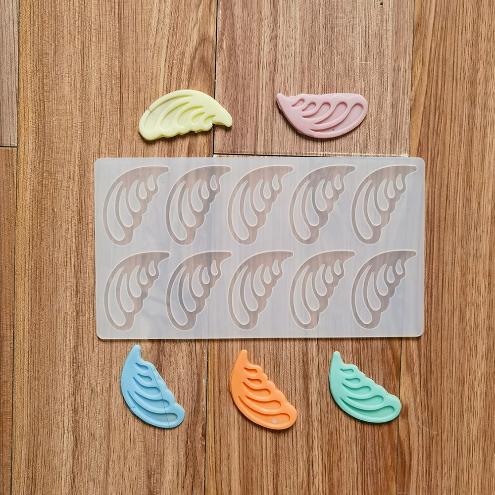 Wings chocolate silicone mold DIY candy pudding dessert mold cake decoration plugin kitchen baking utensils
Wings chocolate silicone mold DIY candy pudding dessert mold cake decoration plugin kitchen baking utensils