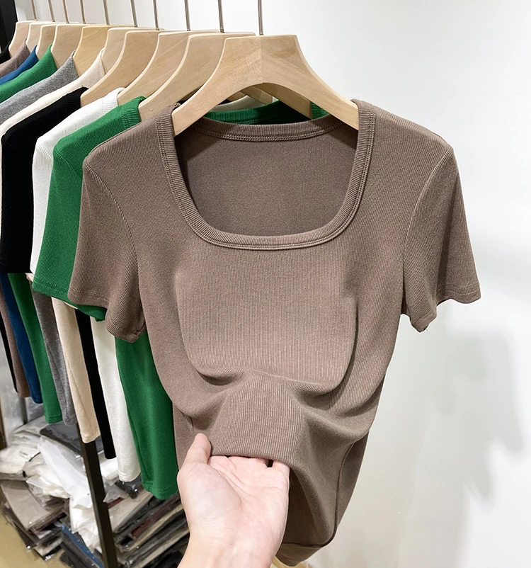 تي شيرت نسائي جديد لعام 2024 بقصة ضيقة وأكمام قصيرة، ياقة مربعة مع تصميم خيوط، أنيق للربيع والصيف، ملابس كاجوال عصرية تي شيرت نسائي جديد لعام 2024 بقصة ضيقة وأكمام قصيرة، ياقة مربعة مع تصميم خيوط، أنيق للربيع والصيف، ملابس كاجوال عصرية