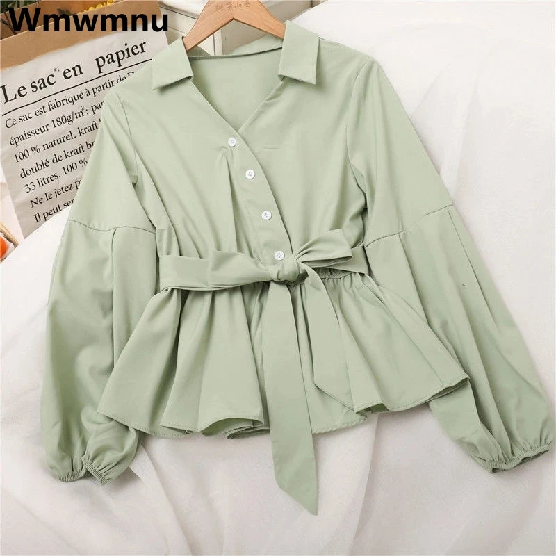 Korean V-Neck Button Ruffle Shirt Women Elegant Lantern Sleeve Elastic Waist Blouses Fashion Sweet Lace-Up Sashes Pullover Tops
Korean V-Neck Button Ruffle Shirt Women Elegant Lantern Sleeve Elastic Waist Blouses Fashion Sweet Lace-Up Sashes Pullover Tops