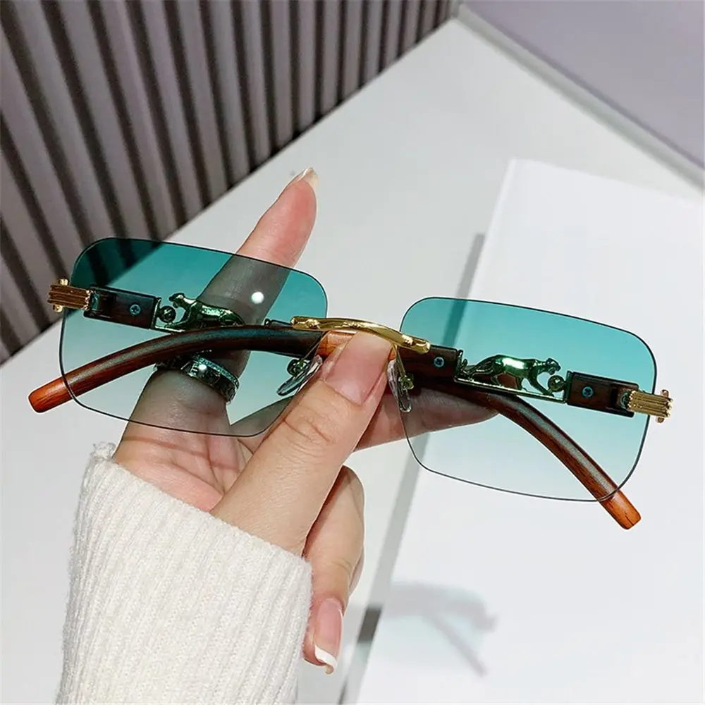 

Metal Temples Rimless Cut Edge Sunglasses Trendy Cool Unique Rectangle Sun Glasses UV400 Retro Shades for Women & Men