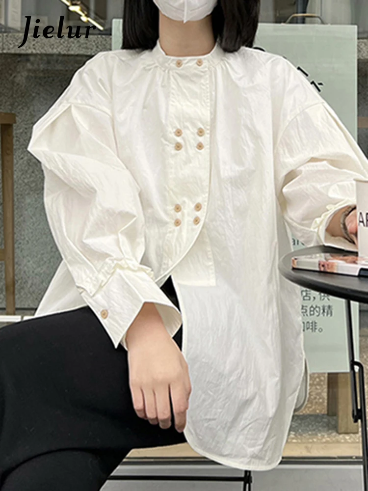 

Jielur Рубашка женская с рукавами-фонариками, модная блуза прямая свободного покроя на пуговицах, модная уличная одежда, простая офисная одежда, белый цвет