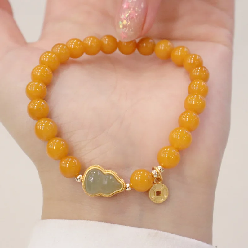 Natural round Beads Yellow Chicken Grease Beeswax Bracelet 6.5mm with 925 Silver Gourd Plated
Natural round Beads Yellow Chicken Grease Beeswax Bracelet 6.5mm with 925 Silver Gourd Plated