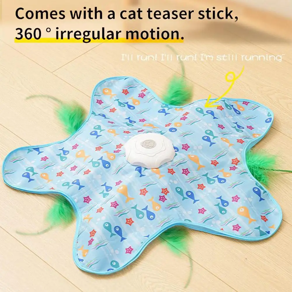 Indoor Cat Toy | Star-Shaped Automatic Cat Toys Overhead view of the blue starfish cat toy on a wooden floor, showing the green feather teaser stick peeking out. Text highlights "Comes with a cat teaser stick, $360^\circ$ irregular motion."