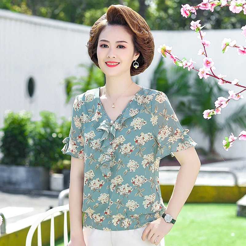 Chiffon Women's Flower Blouse Tops Summer Elegant V-neck Short Sleeve Woman Blouses Shirts Female Floral Printed Ruffles Shirts
Chiffon Women's Flower Blouse Tops Summer Elegant V-neck Short Sleeve Woman Blouses Shirts Female Floral Printed Ruffles Shirts