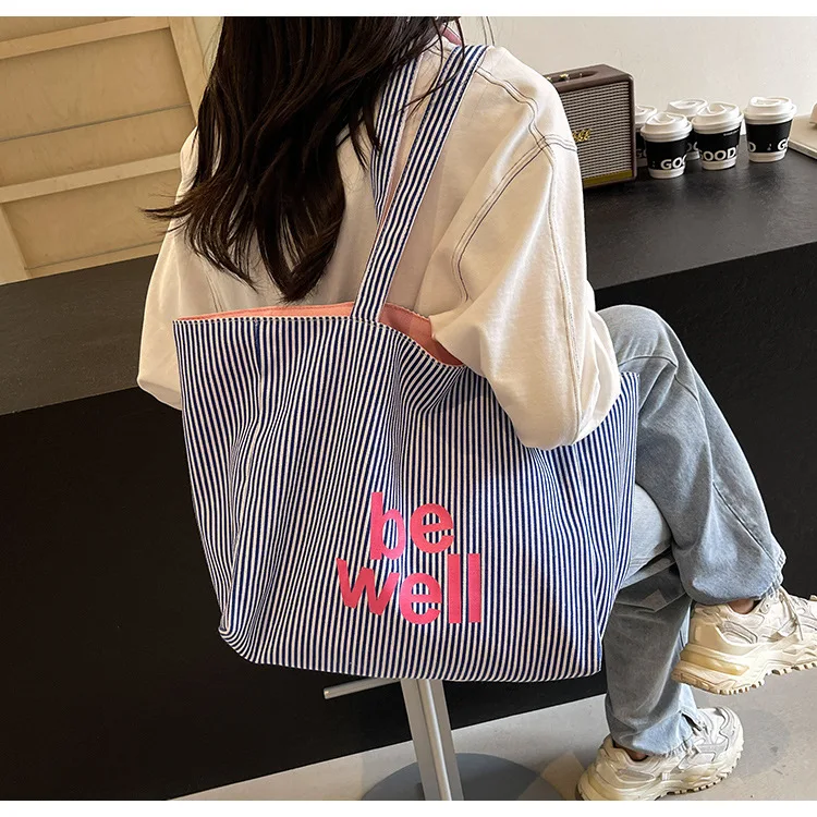 2025 New Fashion Striped Women's Shoulder Bag 13 S0ad5cf9ca36d44ad9d159ddf855e8b0fq