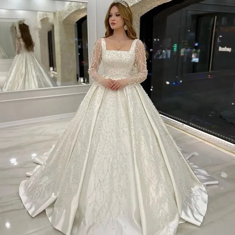Luxury Long Sleeves Wedding Dresses Beads Sequins Princess Ball Gown Square Collar Dubai Bride Gowns For Women Vestido De Novia
Luxury Long Sleeves Wedding Dresses Beads Sequins Princess Ball Gown Square Collar Dubai Bride Gowns For Women Vestido De Novia