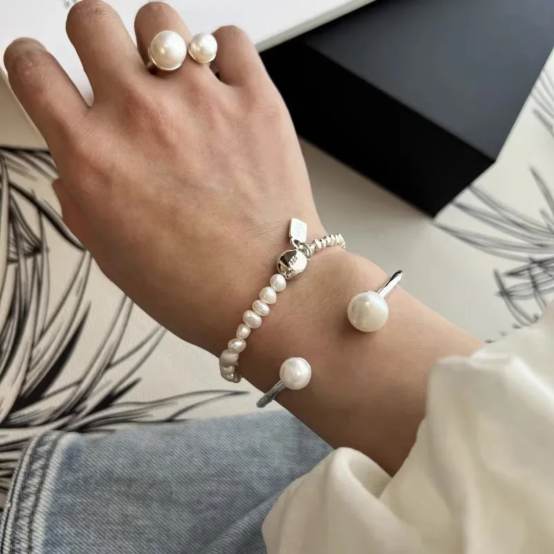 PANJBJ 925 Sterling Silver Pearl Geometry Opening Bracelet for Girl Bead INS Temperament Jewelry Birthday Gift Dropshipping
PANJBJ 925 Sterling Silver Pearl Geometry Opening Bracelet for Girl Bead INS Temperament Jewelry Birthday Gift Dropshipping