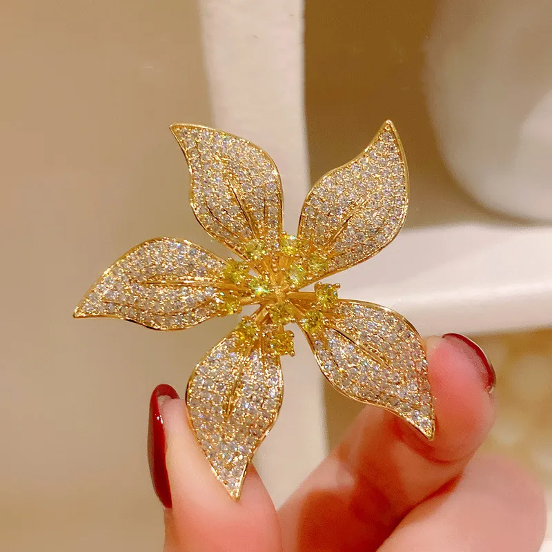 

Premium yellow full diamond micro inlaid Bauhinia brooch brooch brooch female elegant temperament zircon pin buckle