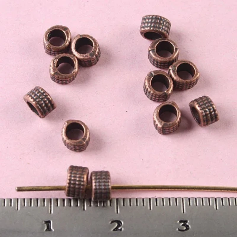 

140pcs copper-tone studded columniform beads h1802