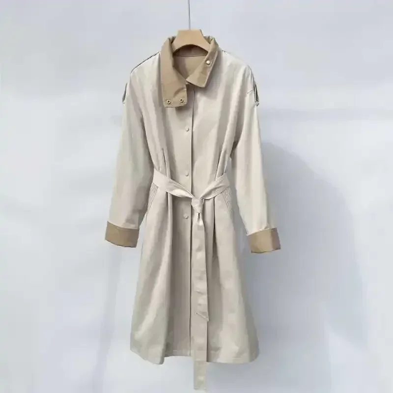 New Autumn and Winter Women New Trench Coat Stand Collar Contrast Color Bead Chain Combed Cotton Waist Long Coat
New Autumn and Winter Women New Trench Coat Stand Collar Contrast Color Bead Chain Combed Cotton Waist Long Coat