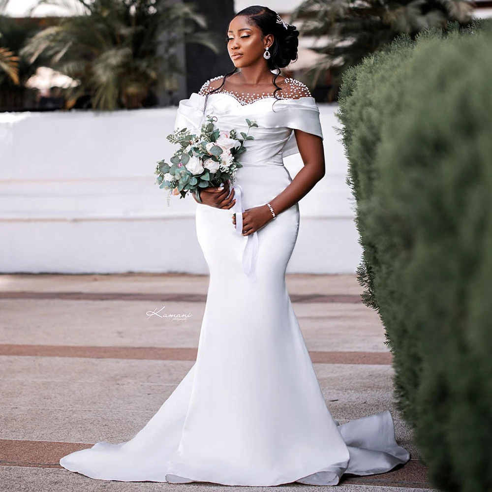 Clean White Mermaid Wedding Dresses for Bride Sheer Neck Sweep Train Pearls Beading Satin Africa Garden Beach Bridal Gowns
Clean White Mermaid Wedding Dresses for Bride Sheer Neck Sweep Train Pearls Beading Satin Africa Garden Beach Bridal Gowns