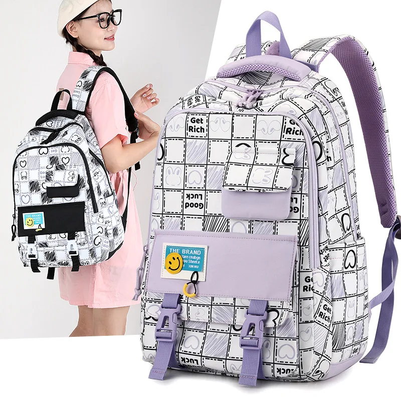 

Schoolbags for Primary School Students with Graffiti Plaid for Boys and Girls Grades 1-6 Ultra-light Spine-protecting Backpack