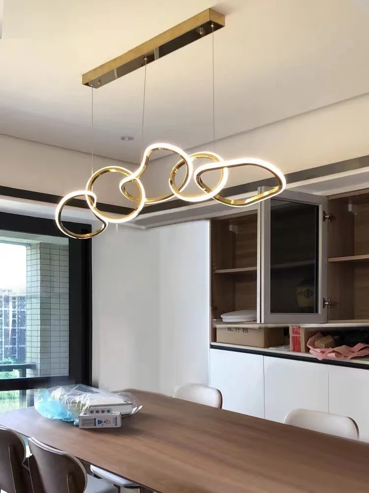Light luxury restaurant LED chandelier Simple postmodern creative personality shape circle ring art minimalist bar chandelier
Light luxury restaurant LED chandelier Simple postmodern creative personality shape circle ring art minimalist bar chandelier