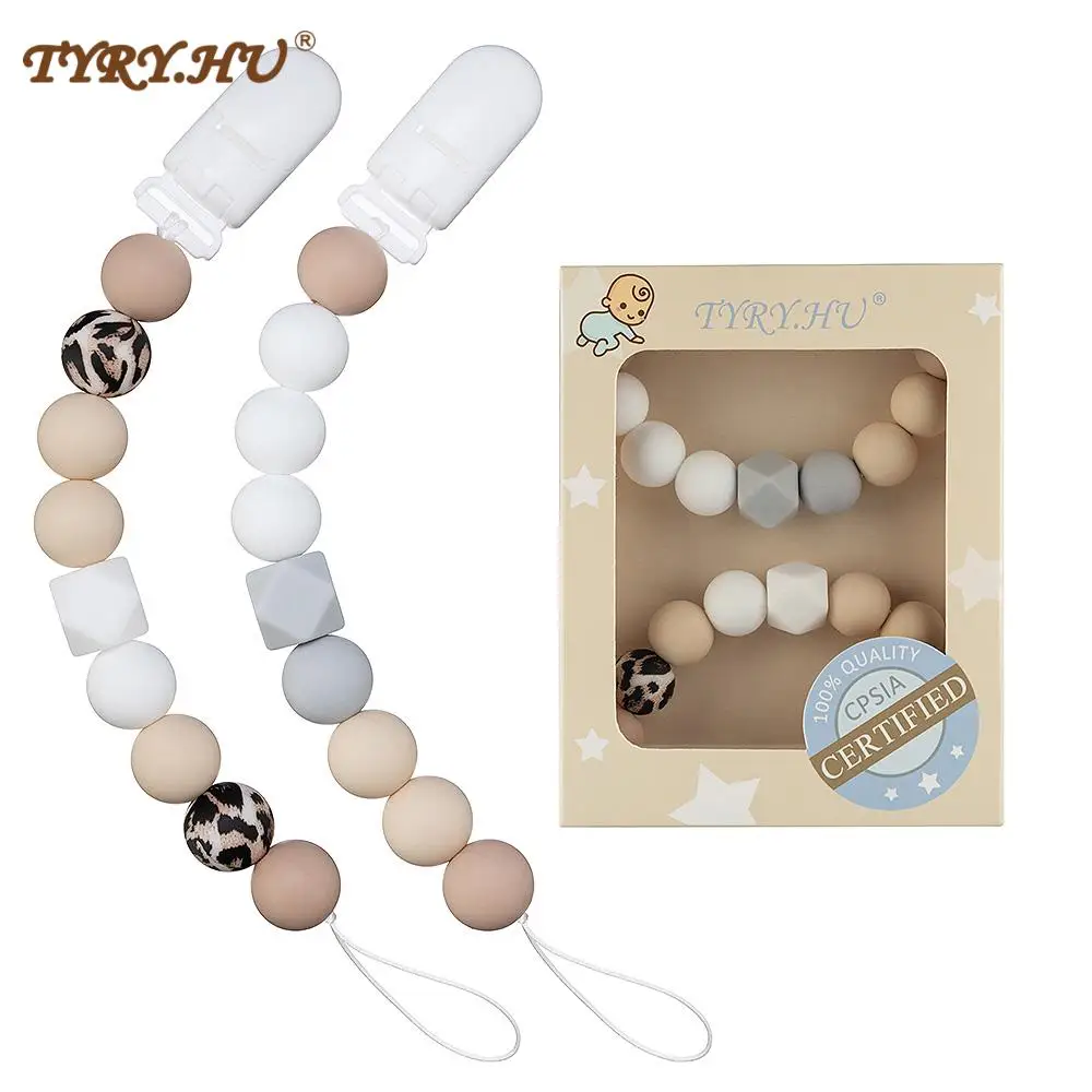 2 шт., силиконовые зажимы для соски-пустышки 
2 шт., силиконовые зажимы для соски-пустышки