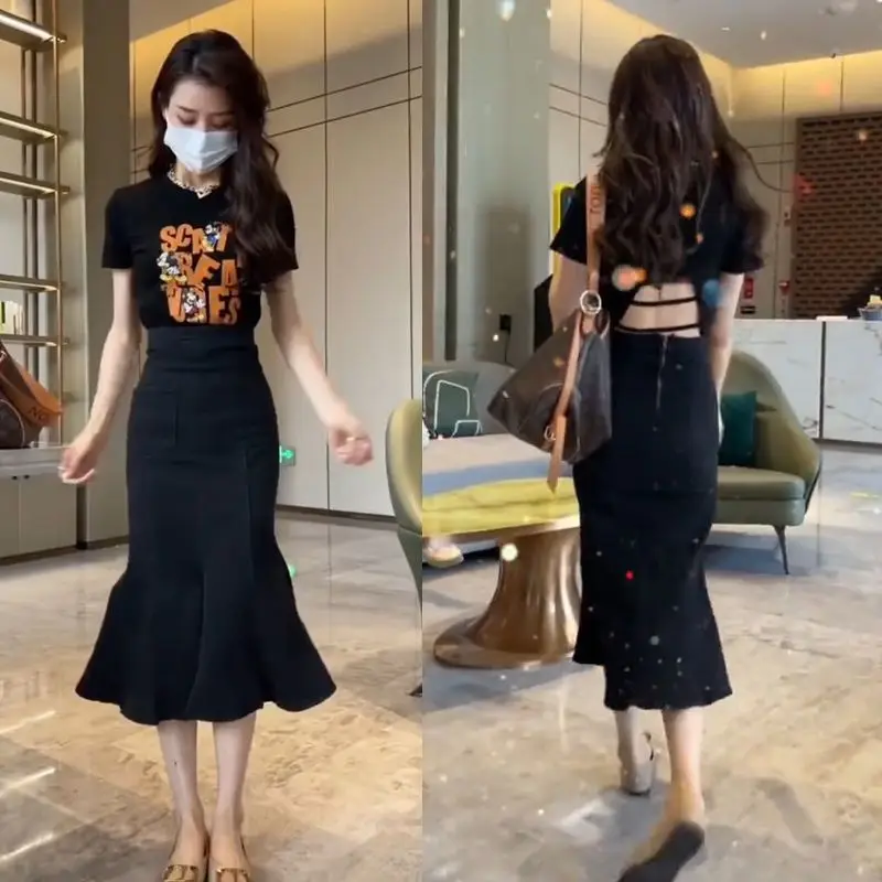 Летний женский костюм, новинка 2023, футболка-ниша со взрывоопасным дизайном, тонкая юбка-годе, из двух предметов 
Летний женский костюм, новинка 2023, футболка-ниша со взрывоопасным дизайном, тонкая юбка-годе, из двух предметов