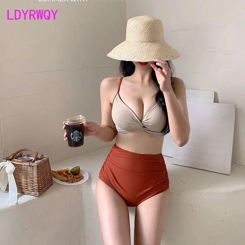 Korean version of women's swimsuit split body high waisted bikini solid color gathers fashionable hot springs
Korean version of women's swimsuit split body high waisted bikini solid color gathers fashionable hot springs